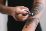 erasing your tattoo, Questions About Erasing Your Tattoo, 7 frequently asked questions about erasing your tattoo answered, Tattoo