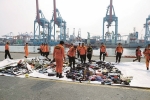 remains from Indonesia plane crash, plane, indonesia plane crash search team recovers more remains, Us warship