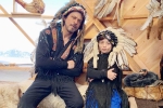 shahrukh khan biography, gauri khan instagram, shah rukh khan and his son abram trolled for sporting native american war bonnets, Cultural appropriation shahrukh khan biography, gauri khan instagram, shah rukh khan and his son abram trolled for sporting native american war bonnets, Cultural appropriation