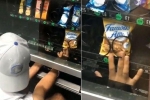 Indian stealing cookies from vending machine, Indian stealing from vending machine in US, watch video of young indian american man allegedly stealing cookies from a vending machine goes viral, Pappu