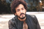 Nagarjuna 100th film breaking updates, Nagarjuna 100th film breaking updates, nagarjuna s 100th film will have akhil in a crucial role, Akhil movie