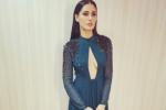 Nargis Fakhri navel show, Nargis Fakhri news, nargis fakhri asked to pin up her dress, Uday chopra