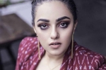 Nithya Menen in Jayalalithaa bipic, Jalyalalitha lifestory, nithya menen stuns movie buffs with jayalalithaa s look in the iron lady, Jayalalithaa biopic